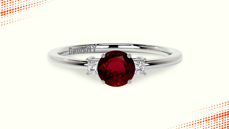 cushion cut ruby ring with round and princess cut diamonds