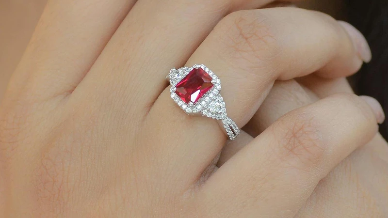 woman wearing ruby ring