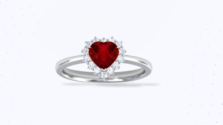 Heart-shaped ruby bezel set solitaire ring